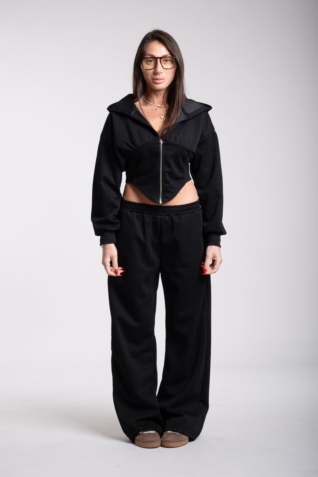 Tuta crop nera