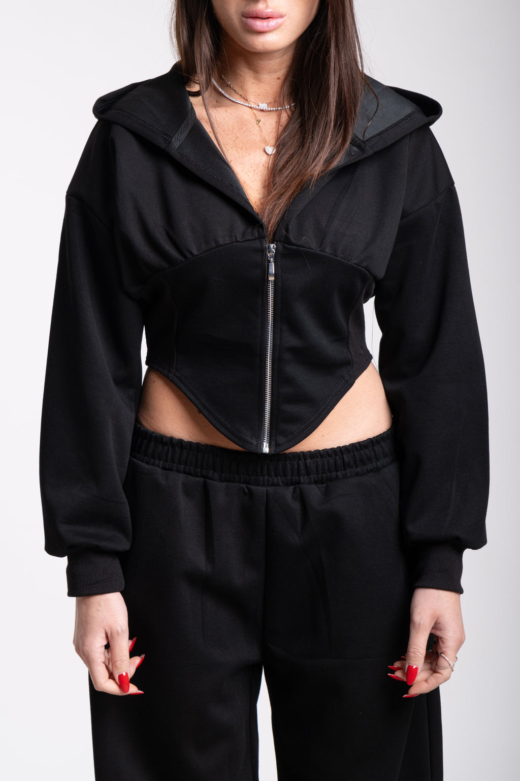 Tuta crop nera