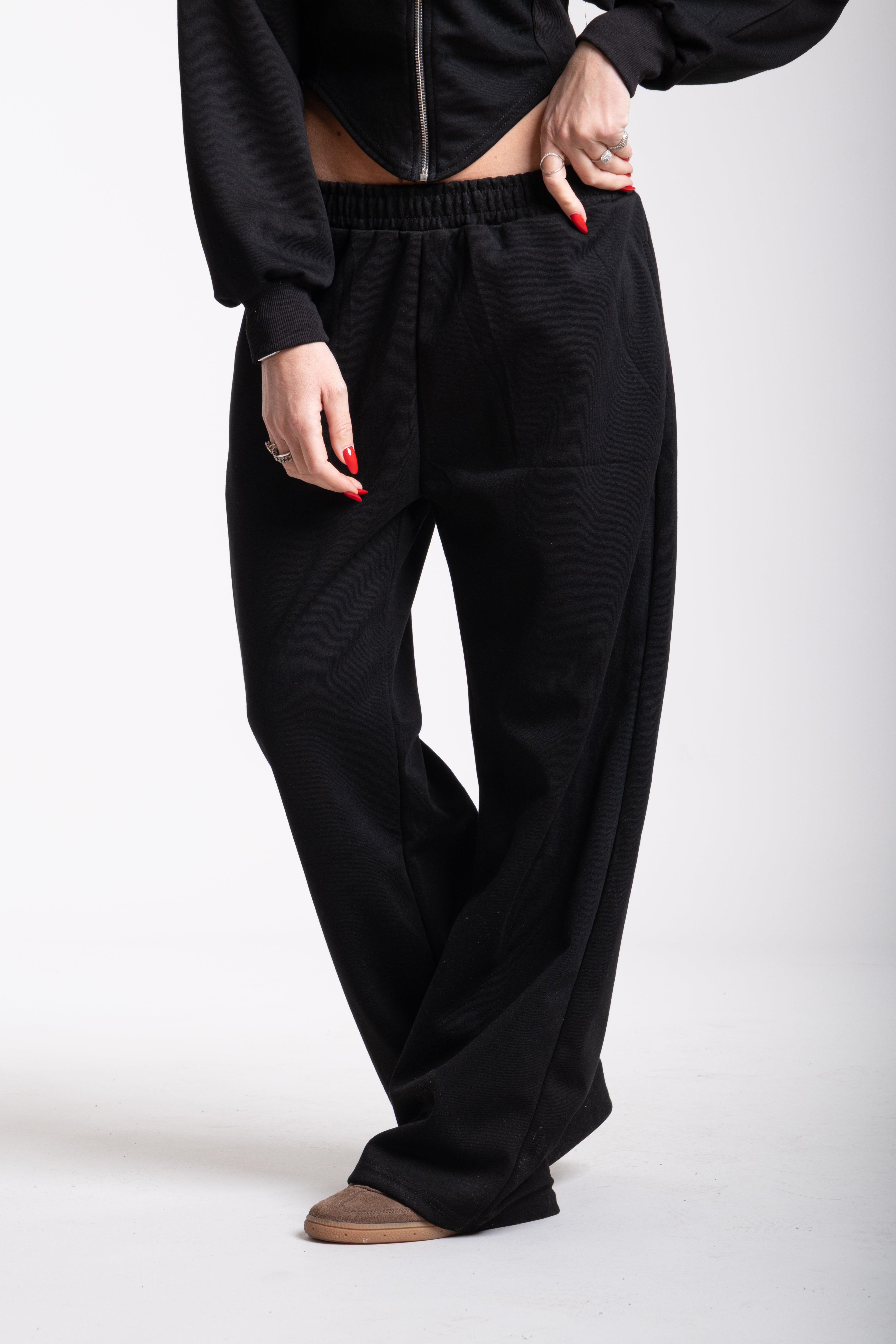 Tuta crop nera