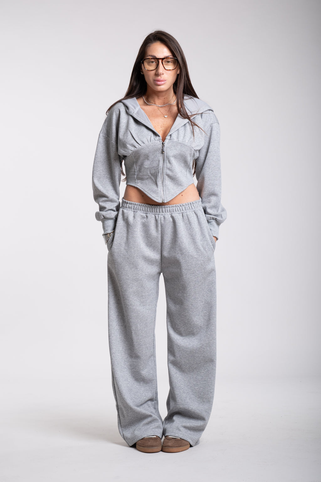Tuta crop grigia